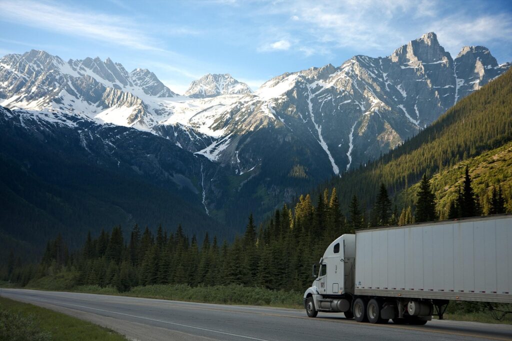 truck, freight, transportation, trailer, moving, mountains, road, semi-trailer, semi, cargo, carrier, delivery, dry van, haul, haulage, highway, scenic, canada, nature, british columbia, blue road, blue truck